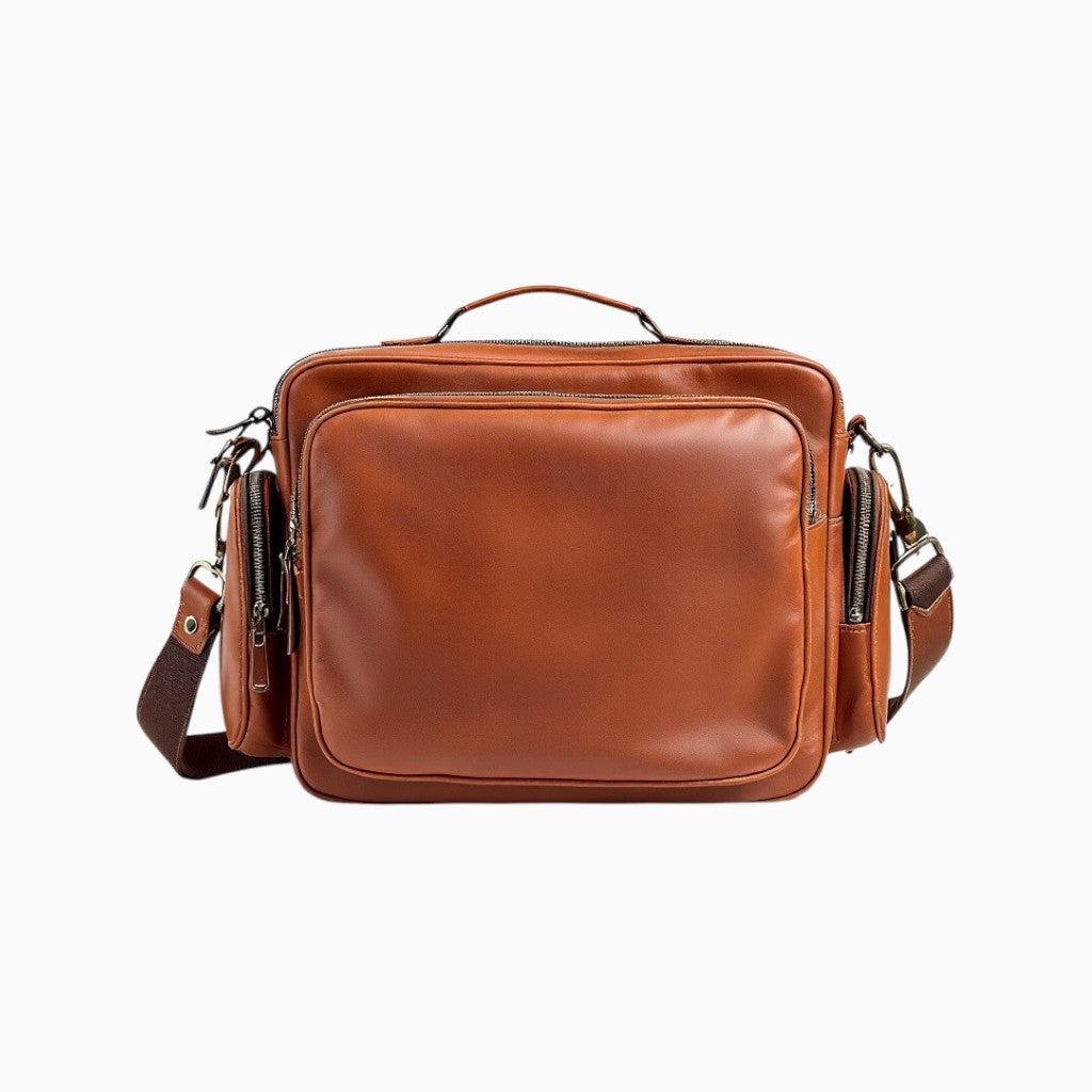 Wyoming Jack full-grain leather camera bag with multiple pockets and adjustable strap for photographers