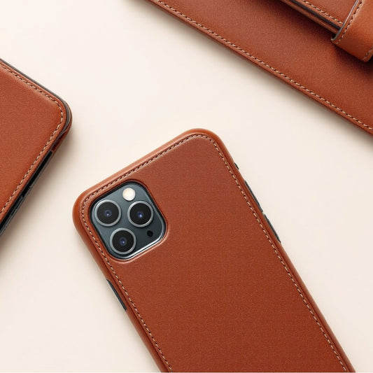 Wyoming Jack full-grain leather phone case in rich brown color with precise cutouts for camera and buttons