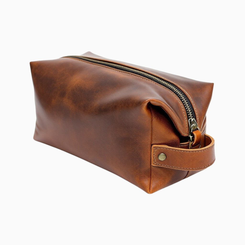 Brown Wyoming Jack full-grain leather dopp kit with a sleek design and durable zipper
