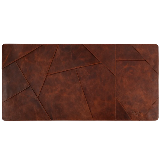 Flatlay image of Wyoming Jack Cutstone Leather Desk Mat showcasing its smooth leather surface and rectangular shape.