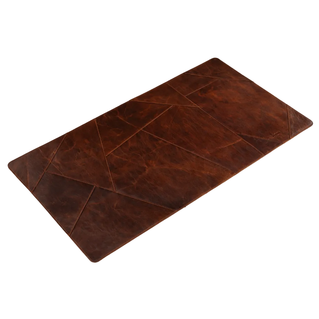 Diagonal view of Wyoming Jack Cutstone Leather Desk Mat showing rich brown leather surface with smooth edges for a stylish workspace.