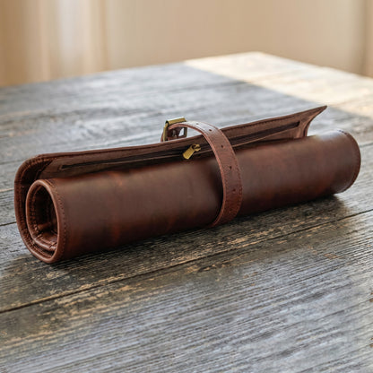 Wyoming Jack CrossCut leather knife roll for chefs with zipper pocket, featuring multiple knife compartments and durable stitching.