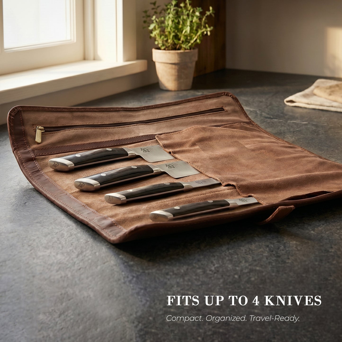 Wyoming Jack CrossCut leather chef knife roll with zipper pocket, designed for storing and organizing culinary knives.