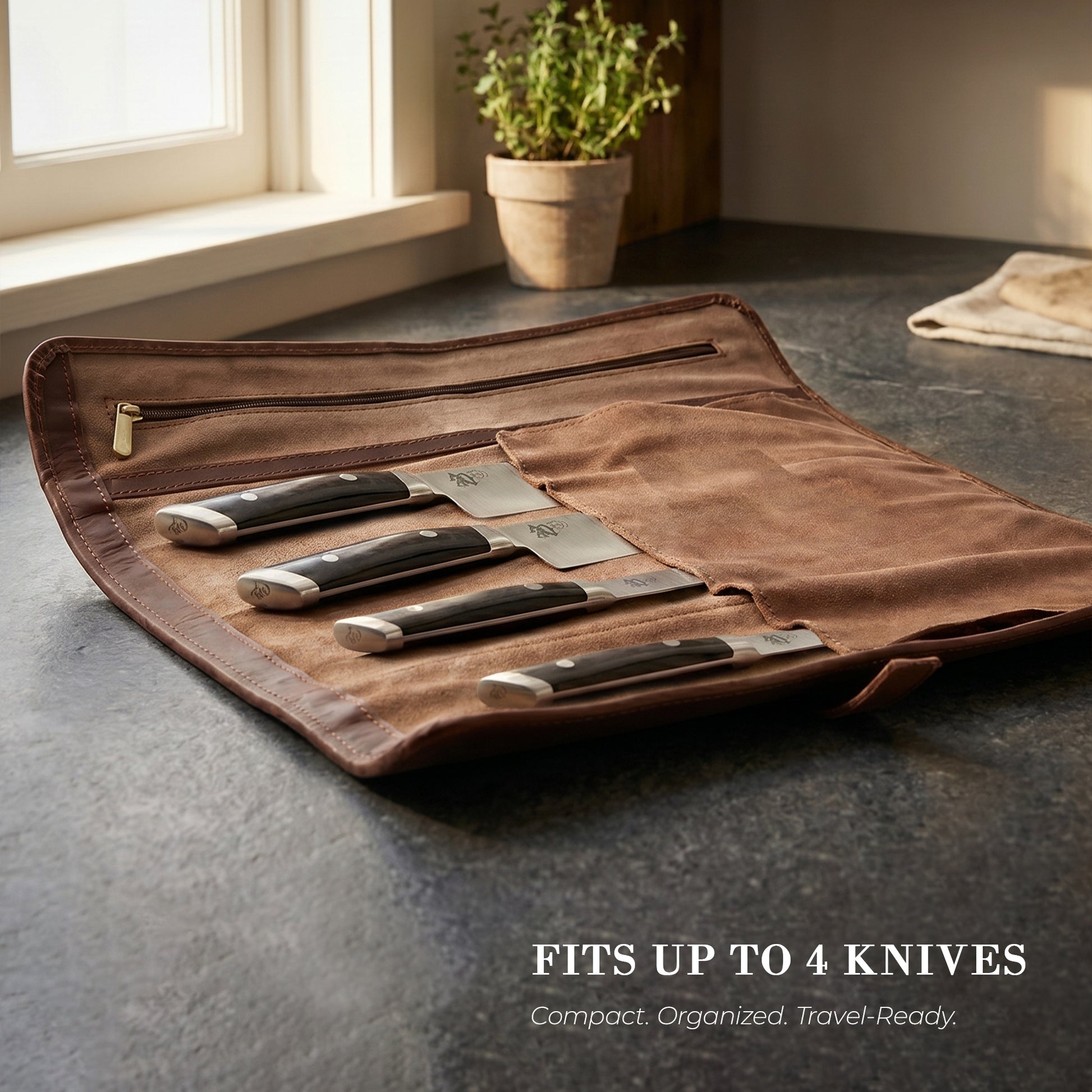 Wyoming Jack CrossCut leather chef knife roll with zipper pocket, designed for storing and organizing culinary knives.