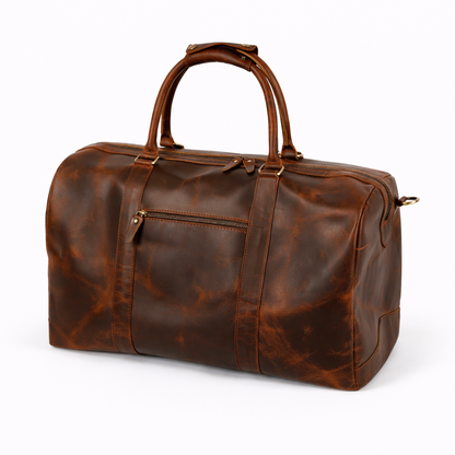 Wyoming Jack Trail Boss leather duffle bag in Brandy color, showing its spacious design and sturdy leather construction.