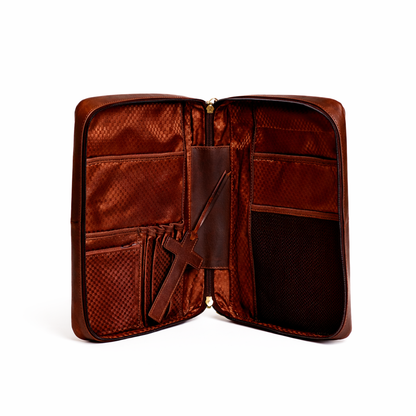Open Wyoming Jack Frontier Leather Bible Cover showing interior compartments and durable leather exterior.
