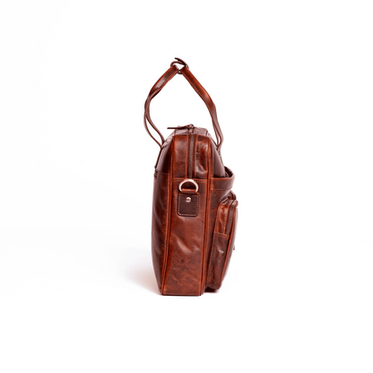 Wyoming Jack Frontier leather briefcase with sturdy handle, front pocket, and classic design for professional use.