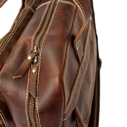 Wyoming Jack Homestead large leather briefcase with multiple compartments, featuring sturdy handles and secure closures.