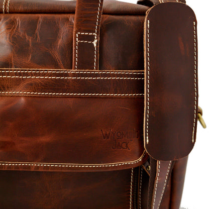 Wyoming Jack Homestead large leather briefcase with multiple compartments, featuring sturdy handles and a professional design.