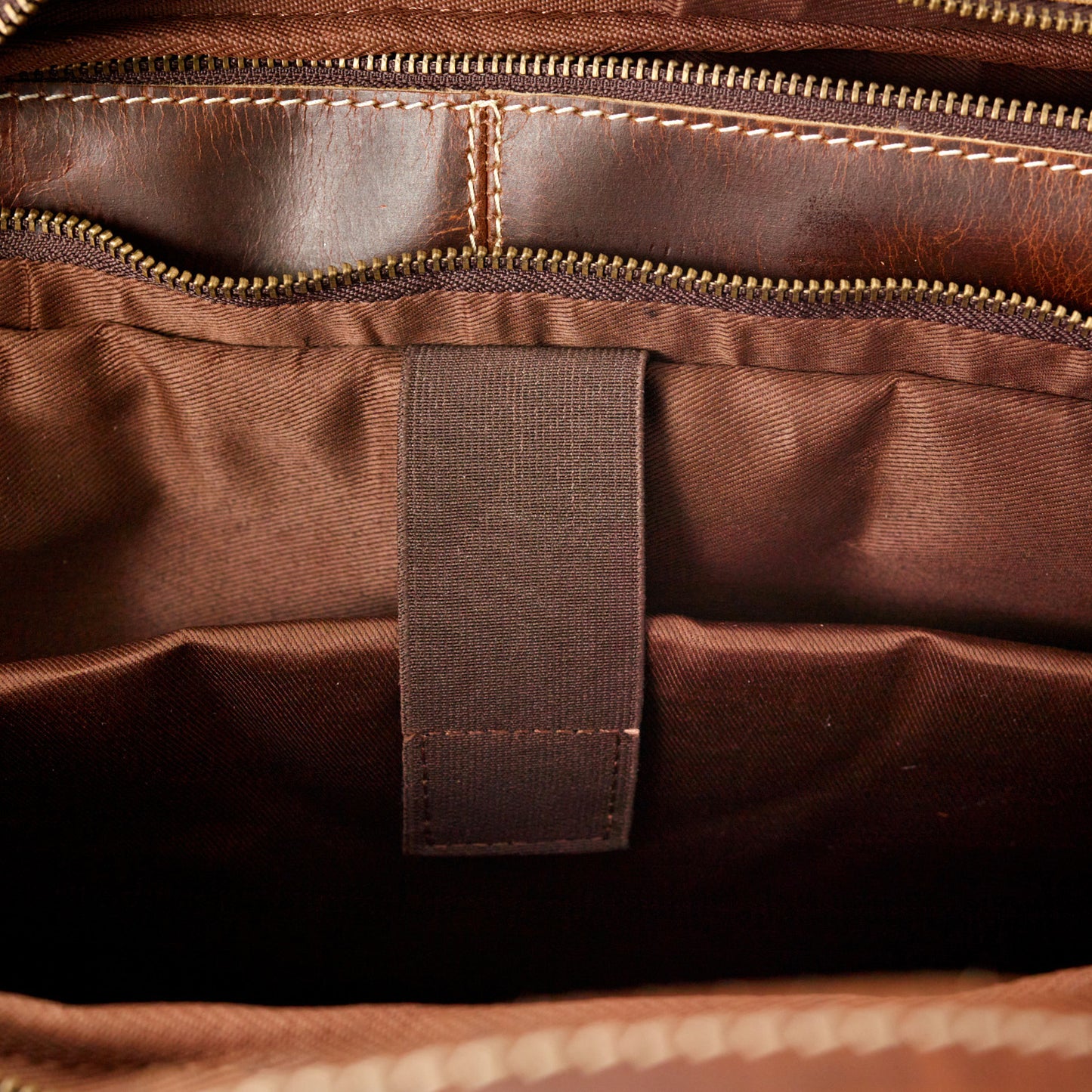 Homestead large leather briefcase by Wyoming Jack with multiple compartments, featuring sturdy handles and classic design.