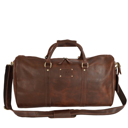 Wyoming Jack Homestead Leather Duffle Bag for weekend travel, rugged design with leather handles and spacious interior.