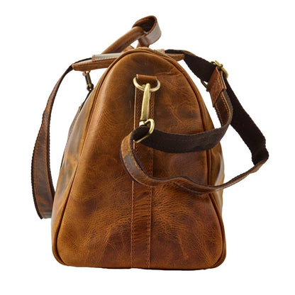 Wyoming Jack Badlands leather duffle bag, 20-inch carry-on size, with sturdy handles and premium leather finish.