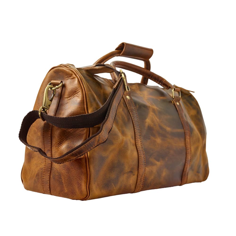 Wyoming Jack Badlands Leather Duffle Bag 20 Inch carry-on with sturdy leather construction and brass hardware for travel.