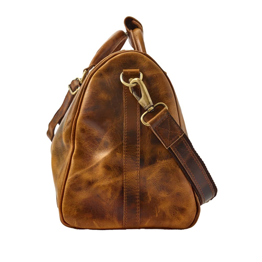 Wyoming Jack Badlands leather duffle bag, 20-inch carry-on with sturdy handles and classic leather finish for travel.