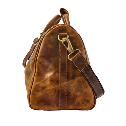 Wyoming Jack Badlands leather duffle bag, 20-inch carry-on with sturdy handles and classic leather finish for travel.