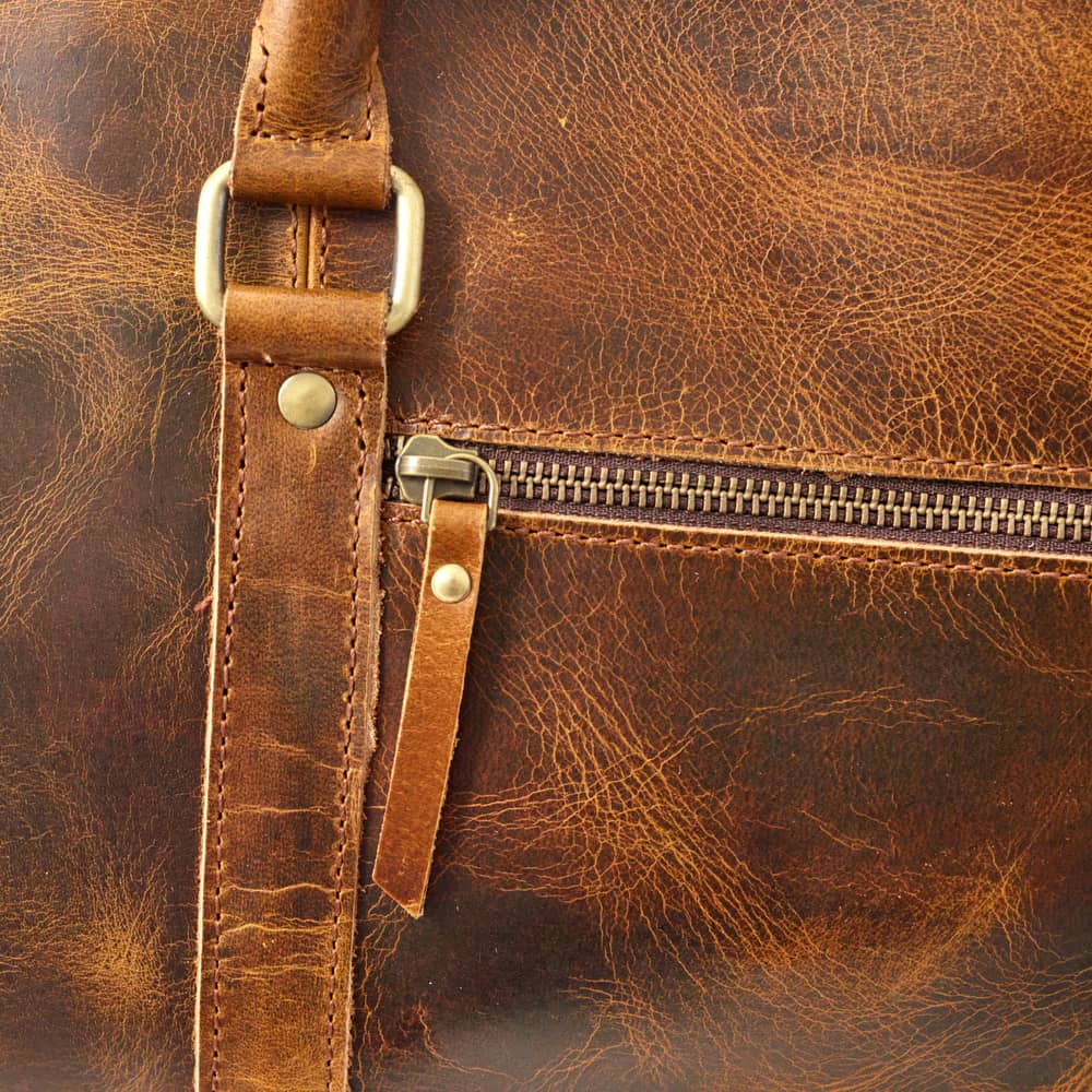Wyoming Jack Badlands Leather Duffle Bag 20 Inch carry-on with sturdy handles and leather finish, ideal for travel and weekend trips.