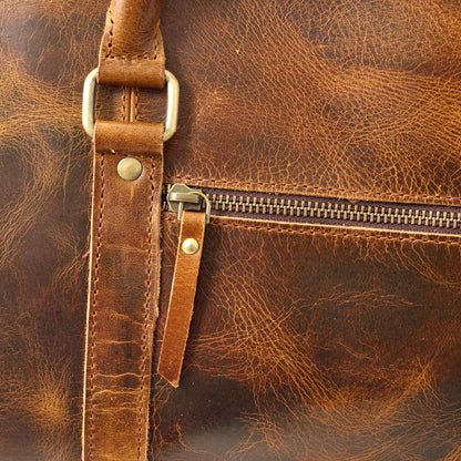 Wyoming Jack Badlands Leather Duffle Bag 20 Inch carry-on with sturdy handles and leather finish, ideal for travel and weekend trips.