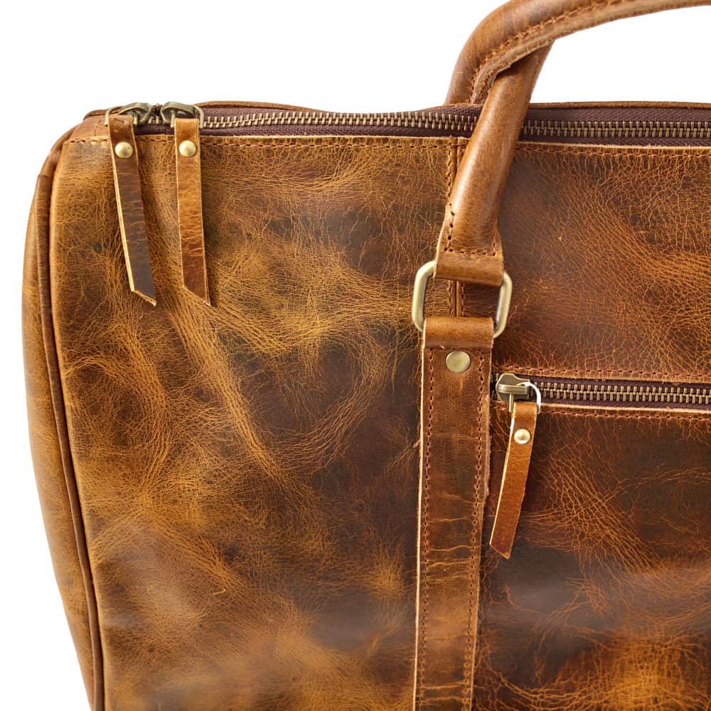 Wyoming Jack Badlands Leather Duffle Bag 20 Inch carry-on with sturdy handles and spacious interior for travel storage.