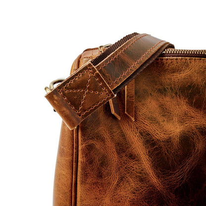 Wyoming Jack Badlands leather duffle bag, 20-inch carry-on size, with sturdy handles and classic leather finish.