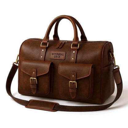 Wyoming Jack Expedition Leather Duffle Bag with personalized custom engraving, featuring sturdy leather construction and spacious interior.