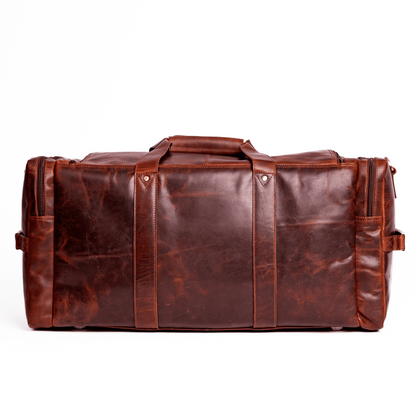 Wyoming Jack Frontier Leather Duffle Bag with sturdy handles and spacious interior, perfect for travel and weekend trips.