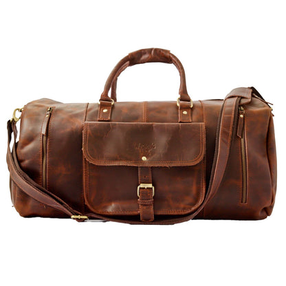 Wyoming Jack Badlands leather duffle bag with shoe compartment, rugged design and sturdy handle for travel and weekend trips.