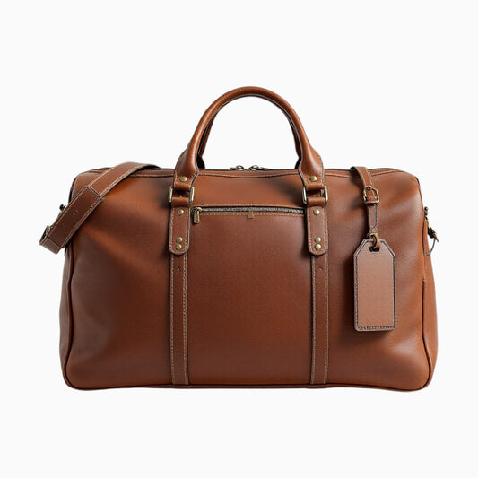 Full-grain Leather Duffle Bag by Wyoming Jack featuring sturdy handles and adjustable shoulder strap