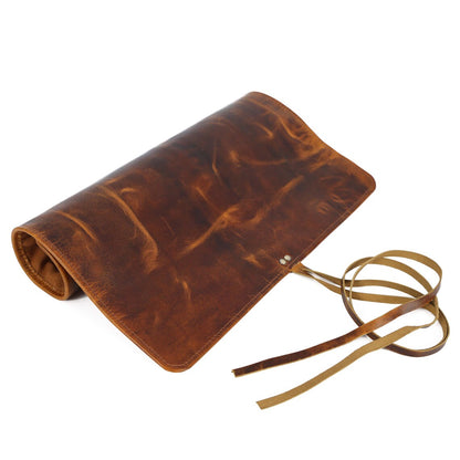 Wyoming Jack leather knife roll with six slots for knives, personalized and custom-made for secure storage and transport.