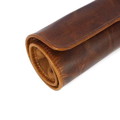 Wyoming Jack leather knife roll holding six knives, personalized and custom-crafted for secure storage and easy transport.