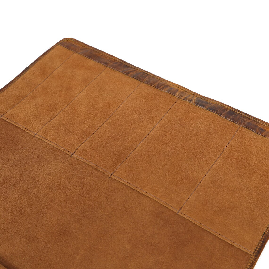 Wyoming Jack leather knife roll for 6 knives, custom personalized with secure snap closures and durable leather exterior.