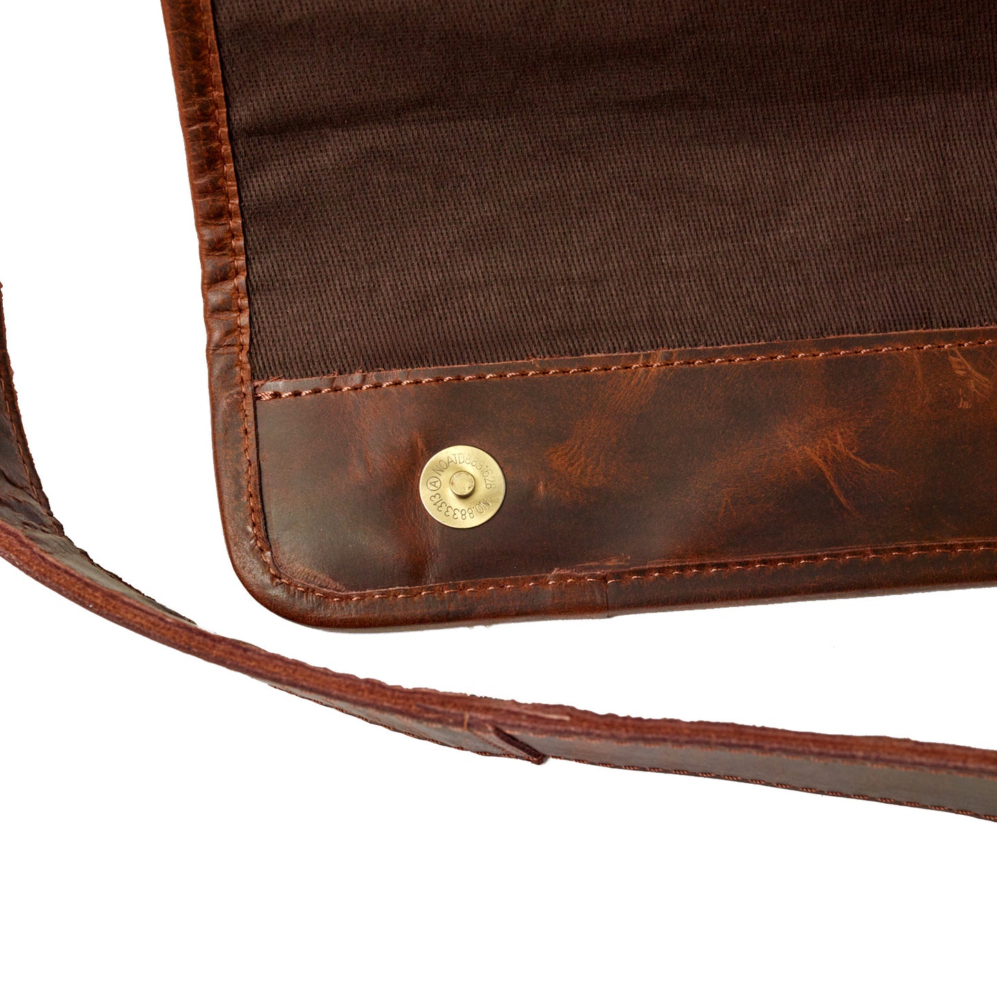 Wyoming Jack Homestead Messenger Bag in durable canvas with leather accents, featuring adjustable strap and front pocket.