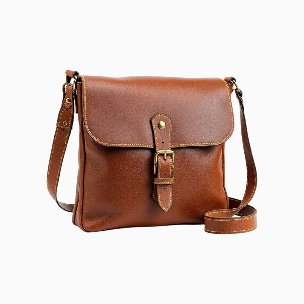 Wyoming Jack leather shoulder bag with customizable and personalized design, featuring a sleek brown leather exterior and adjustable strap.
