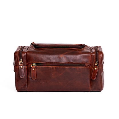 Wyoming Jack Frontier Leather Toiletry Bag for travel, featuring durable leather exterior and spacious interior for toiletries.