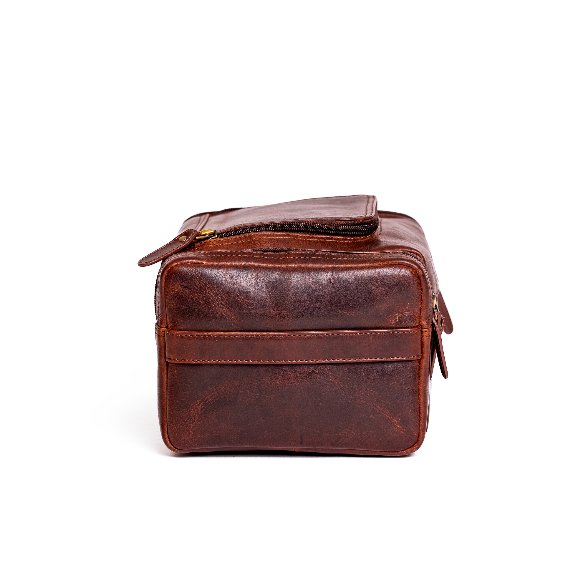 Wyoming Jack Frontier leather toiletry bag for travel, front view showing durable leather material and compact design
