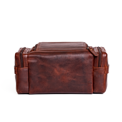 Wyoming Jack Frontier leather toiletry bag for travel, front view showing durable leather and compact design.