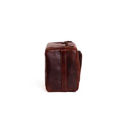 Wyoming Jack Frontier leather toiletry bag for travel, featuring a brown leather exterior and compact design for toiletries.